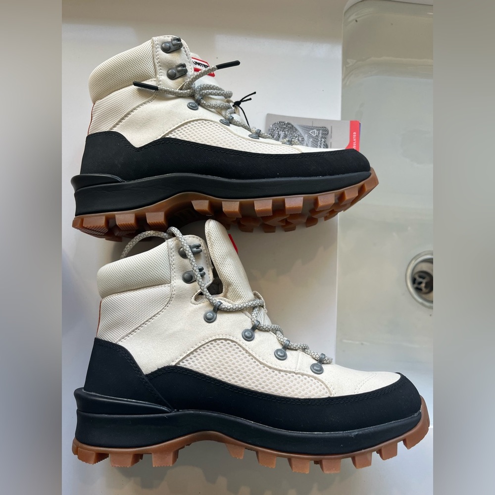 Brand new with tags Hunter rain/ snow boots. Woman’s size US 7 but fit roomy.